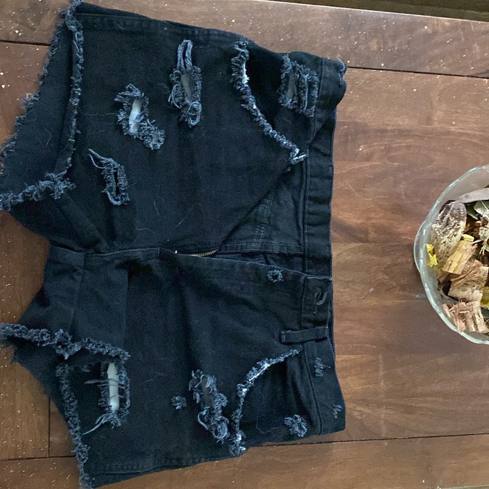 Black ripped shorts
